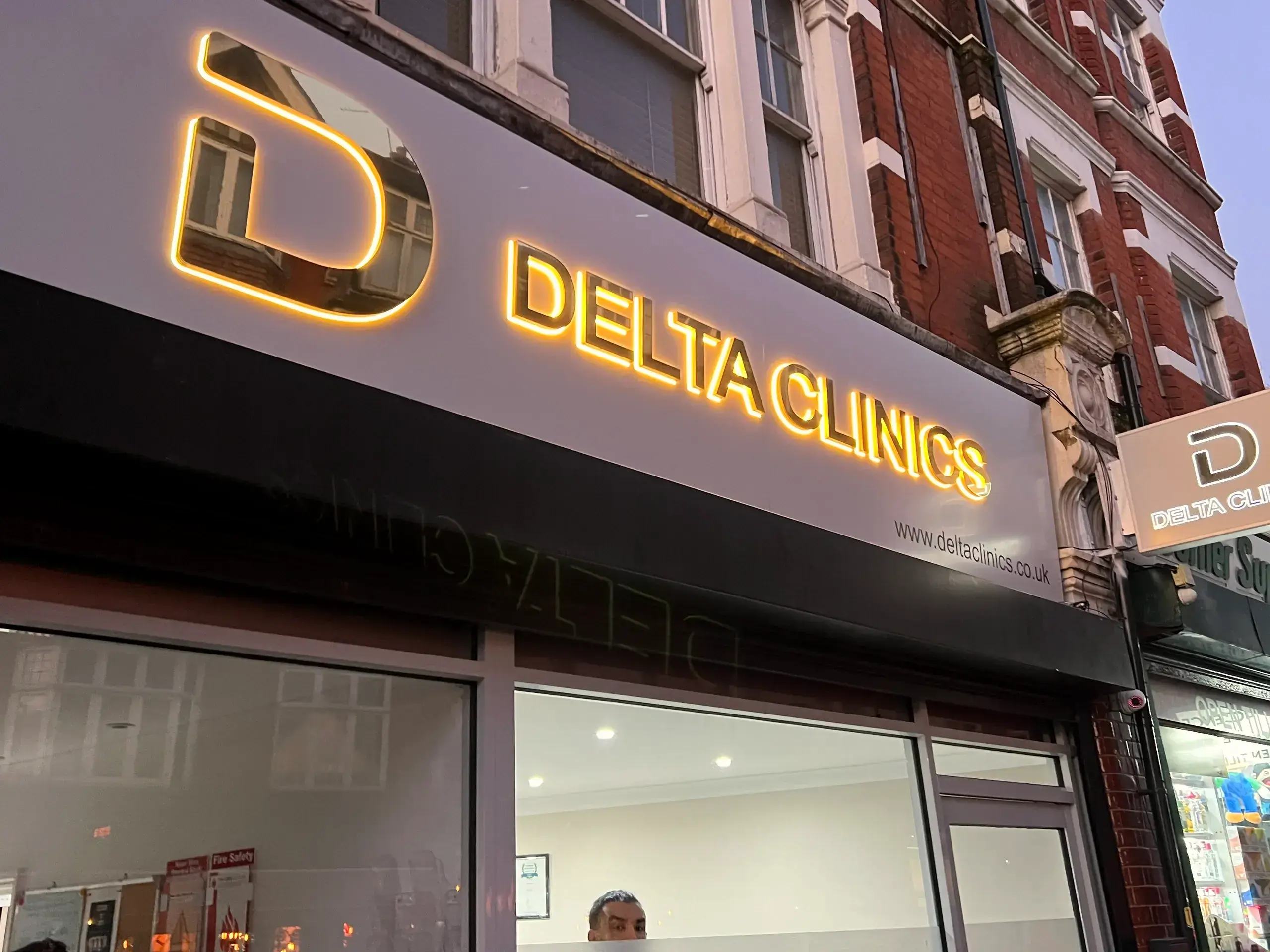 Delta Clinics 3D signage with warm white LED halo light Finchley North London