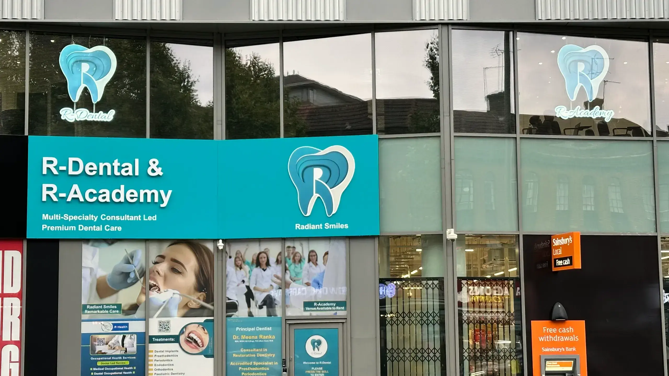 Expanded PVC 3D sign installation for R-Academy and R-Dental in North London by Sign Group, featuring bold lettering and Radiant Smiles logo